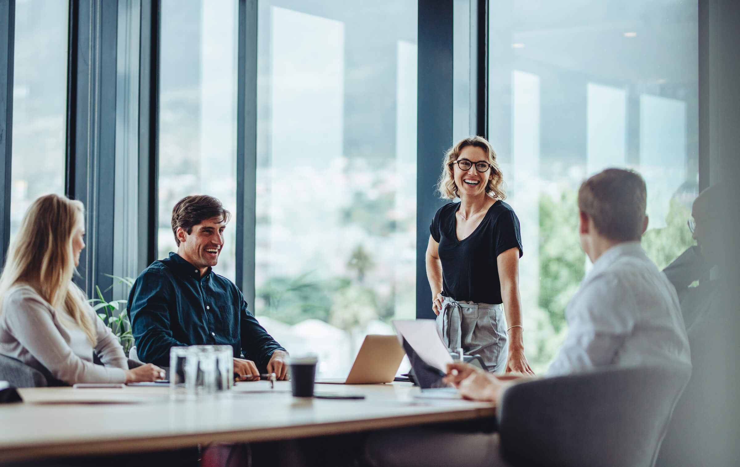 business people having casual discussion during meeting